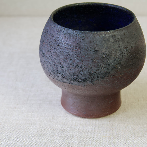 Highly textured brown glaze on unique Liisa Hallamaa studio pottery vase from Arabia, Finland, showing a rustic and organic Brutalist aesthetic.