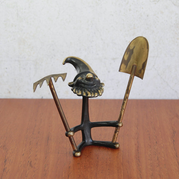 Walter Bosse playful garden gnome with tools, charming mid-century Modernist brass figurine.
