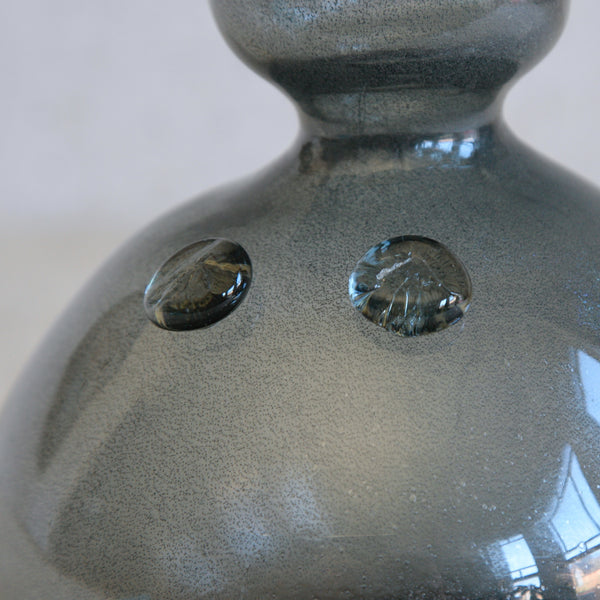 Close-up of a Boda Sweden art glass vase by Erik Höglund, inspired by ancient fertility symbols and Nordic folklore, an early example of figurative Scandinavian modernism.