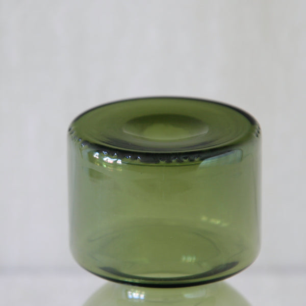 Detail of the base and heel of a mid-century Finnish glass decanter by Kaj Franck, this piece is part of a Kremlin Kellot or Kremlin Bells decanter set.