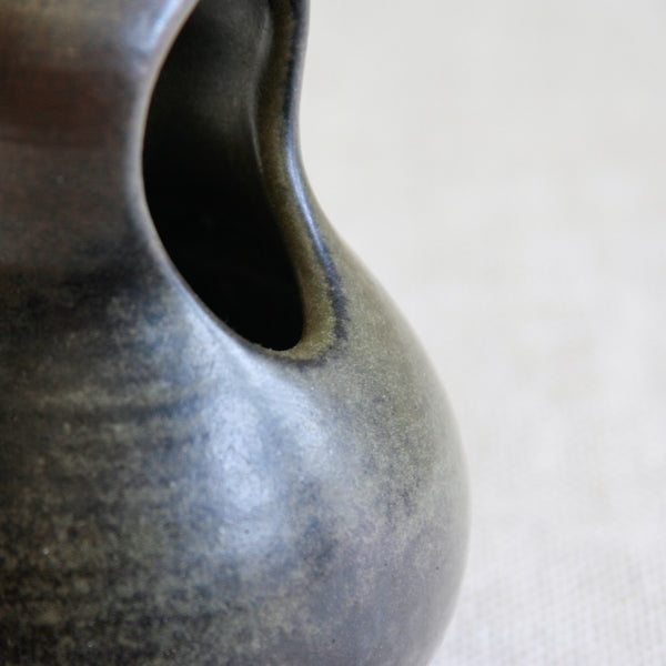 Close-up of a textured ceramic sculptural Modernist vessel by Francesca Mascitti Lindh, hand-thrown at the Arabia art studio in Finland around 1960.