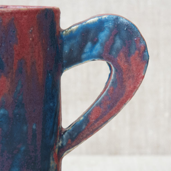 Detail of a exaggerated handle cut from a slab of porcelain. This is a great example of Emmanuel Coopers work. 