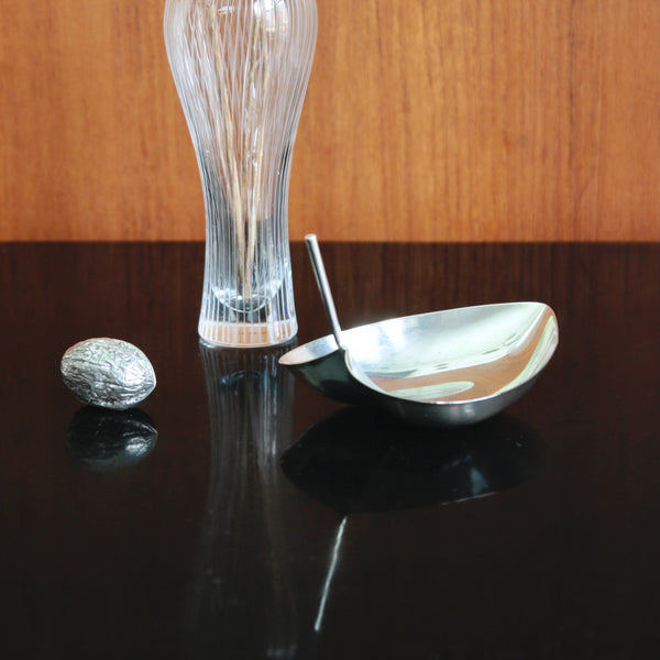 Vintage Tapio Wirkkala silver bowl with sculptural leaf form and central handle.