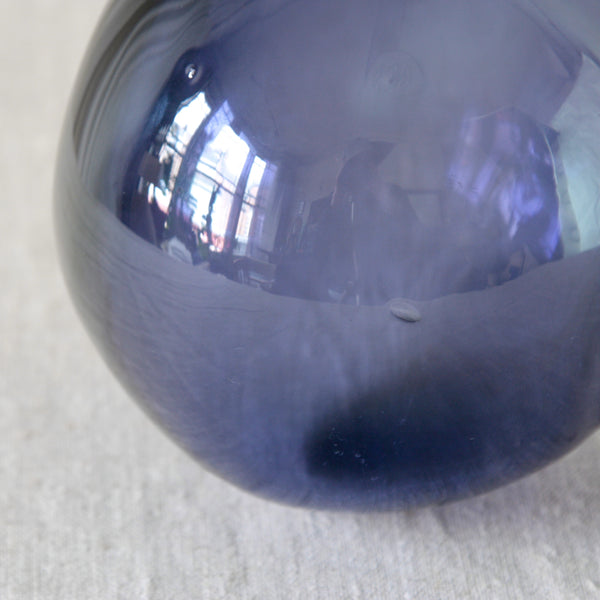 Detail of a bubble in glass jug.