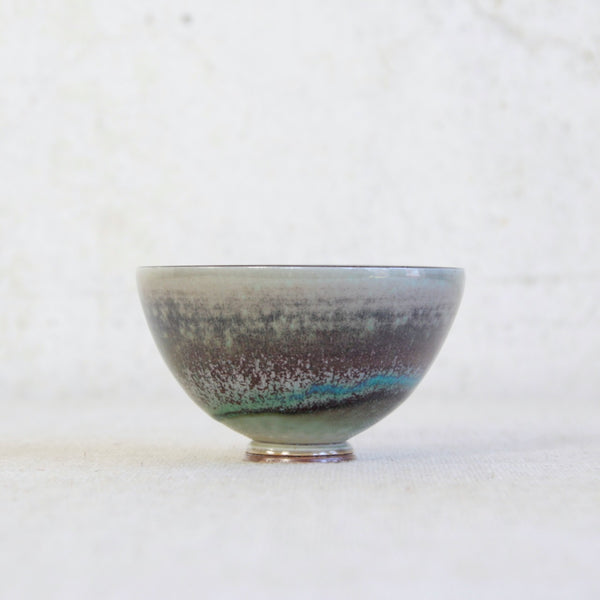 A rare 1972 Berndt Friberg porcelain bowl for Gustavsberg featuring aubergine and turquoise glazes; a masterpiece of Scandinavian studio pottery and modern design.