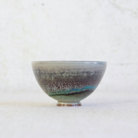 A rare 1972 Berndt Friberg porcelain bowl for Gustavsberg featuring aubergine and turquoise glazes; a masterpiece of Scandinavian studio pottery and modern design.
