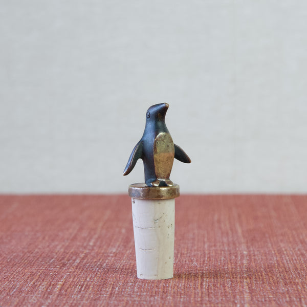Head on shot of a Herta Baller penguin shaped bottle stopper. Channel the spirit of the 1950s with this iconic Walter Bosse designed cork stopper.