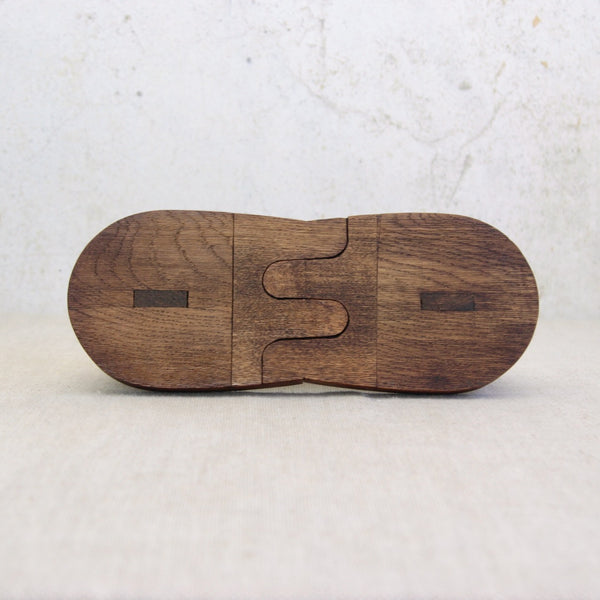 Collectible English oak horse bookends, hand-carved in the 1950s, with subtle geometric detailing and tactile surfaces.