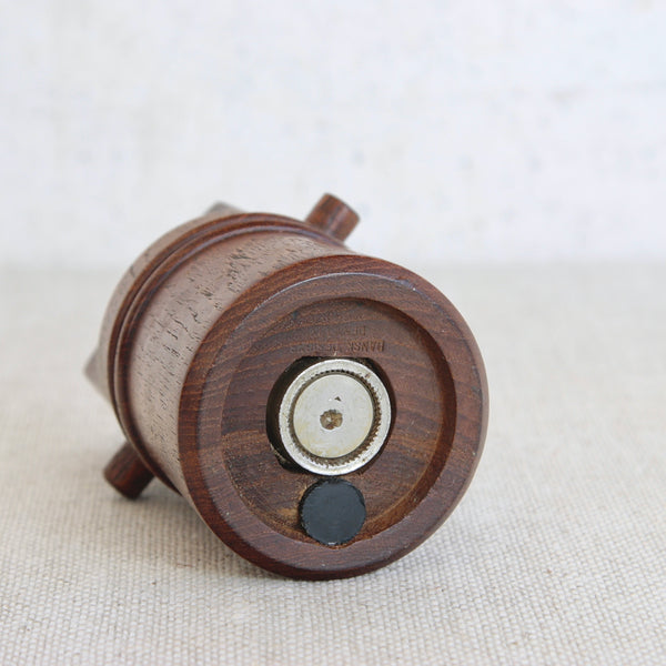 A vintage modernist teak “mouthpiece” pepper mill by Jens Quistgaard for Dansk Designs, crafted in the golden age of Scandinavian design.