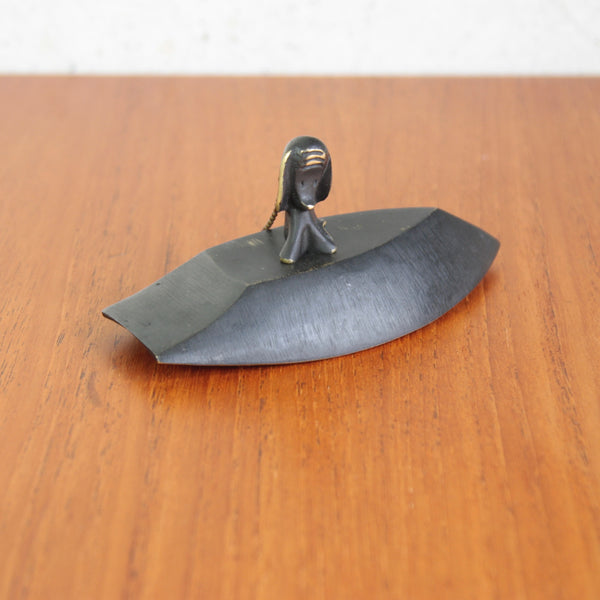 Walter Bosse brass boat tray with dog figurine, early 1950s Vienna, handmade by Herta Baller. A playful mid-century collectible.