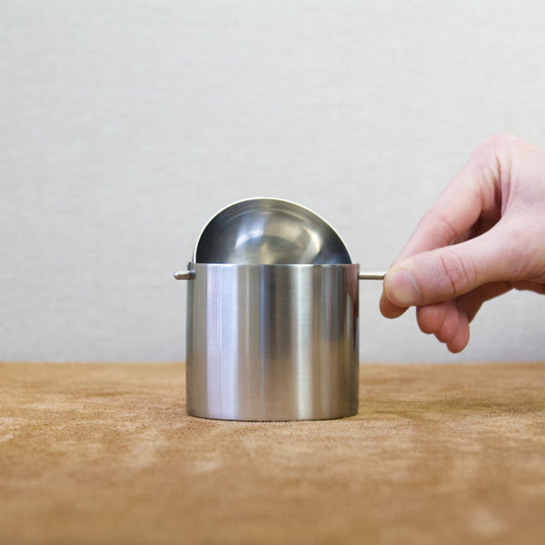 Detail shot of the Cylinda-Line ashtray’s rotating lid mechanism.