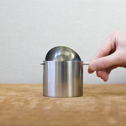 Detail shot of the Cylinda-Line ashtray’s rotating lid mechanism.