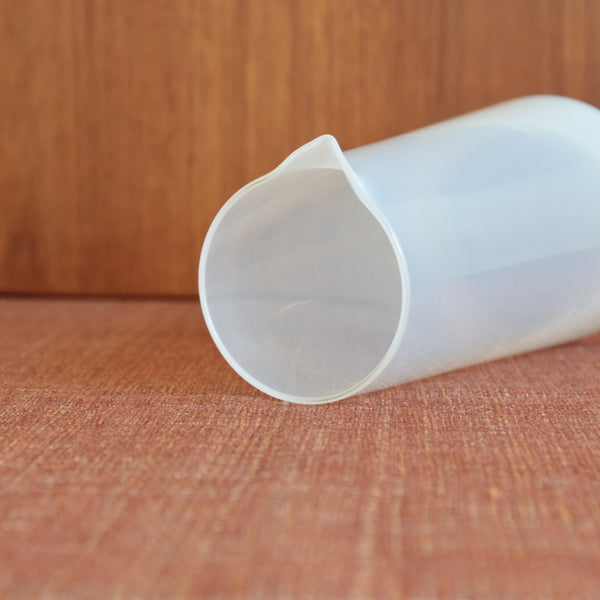 Jacob Bang Opaline carafe photographed against a neutral background to highlight its minimalist Scandinavian profile.