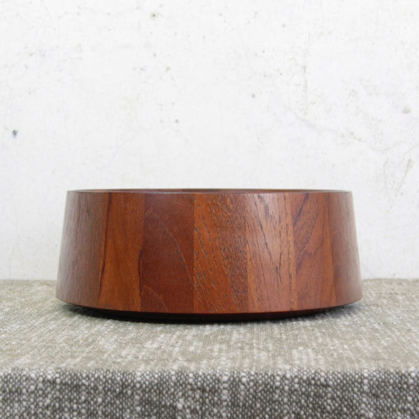 Close up of a 1960s Dansk Designs staved teak bowl by Jens Quistgaard. A collectible mid-century classic with enduring Danish appeal.
