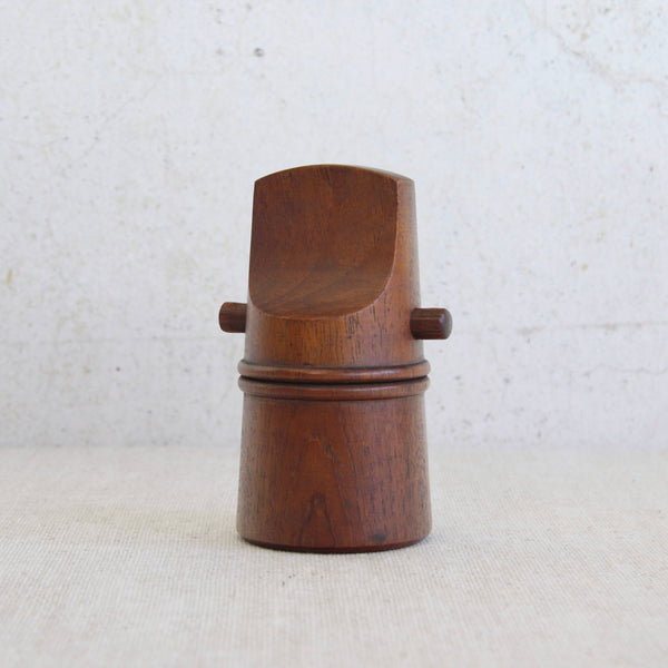 A vintage Scandinavian teak “whistle” pepper mill designed by Jens Quistgaard, representing the best of Dansk Designs modernism.
