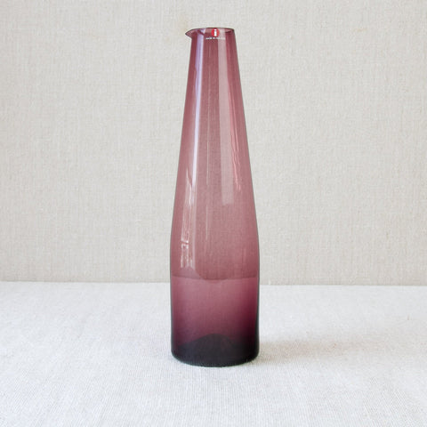 Timo Sarpaneva's 1956 deep plum purple coloured glass carafe or pitcher for Iittala, a very elegant Nordic design