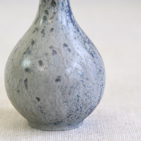 Detail showing organic-form of an Arne Bang Model 71 vase that features a textured mottled glaze that transitions from blue to grey, a characteristic that is now typical of Scandinavian ceramics.