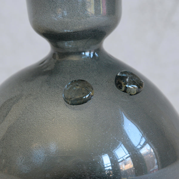 Close-up of a iridescent carborundum glass used to make an Erik Höglund person vase, Boda Sweden, an expressive mid-century Scandinavian design. Museum-quality piece. For sale n the UK.