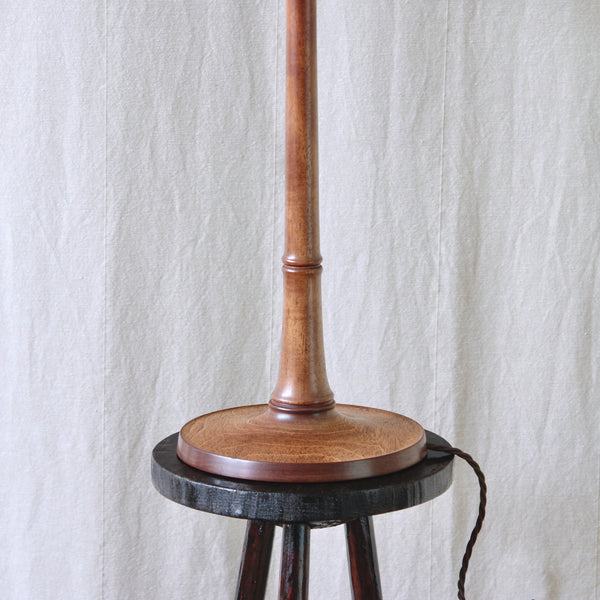 Restored vintage Danish table lamp by Esben Klint for Le Klint, Model 301/27 in dark ash with antique-brown cloth covered cable.