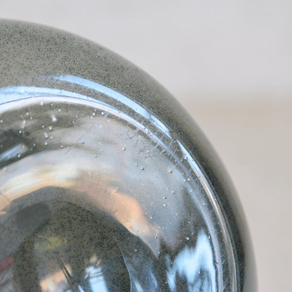 Detail of hand etched signature / makers mark on the base of a scandinavian art glass vase by Erik Höglund for Boda, early 1950s.