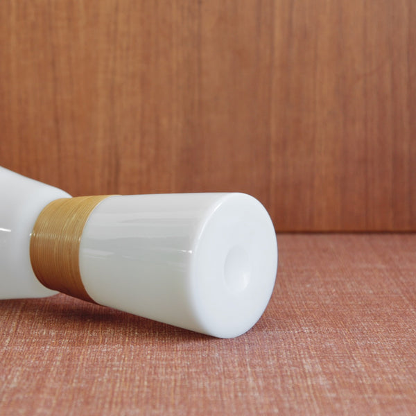 Base of a mid-century Jacob Bang Opaline carafe for Kastrup Glassworks, showing elegant Scandinavian craftsmanship. A refined example of Danish Modern design sought after by Scandinavian glass enthusiasts in East Asia.