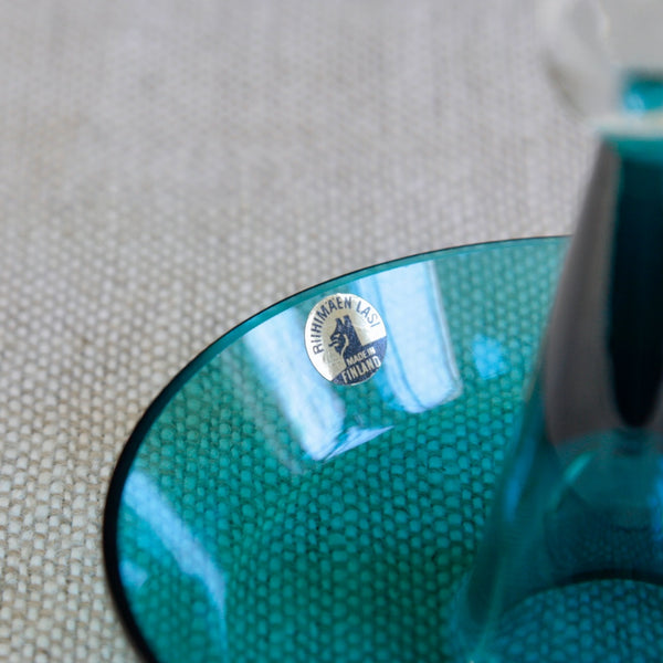 Close up of Riihimäen Lasi sticker on a Mid-century Finnish glass bon bon bowl from the Harlekiini series, designed by Nanny Still. 