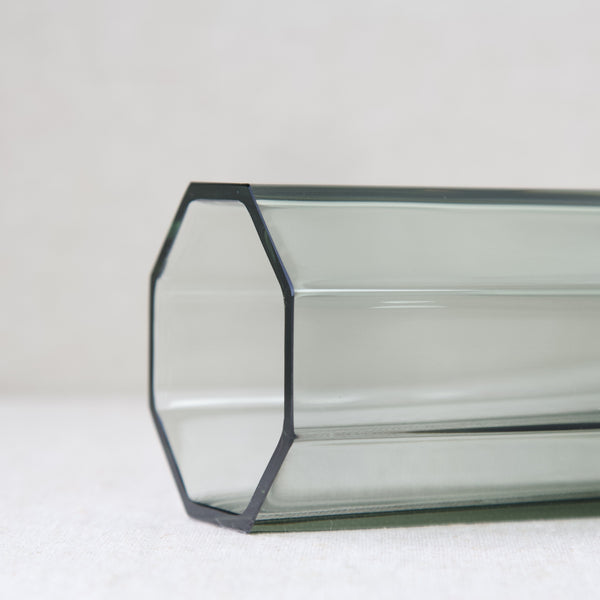 Close up of the edge of a geometric shaped glass vase by Kaj Franck. This model kf298 design and many others can be found at Art & Utility show offer worldwide shipping.