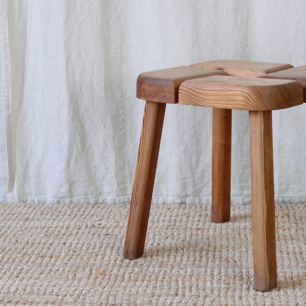 Olof Ottelin Finnsauna Lagerholm stool showing the natural pine grain, exposed joinery and functional openings within the seat.