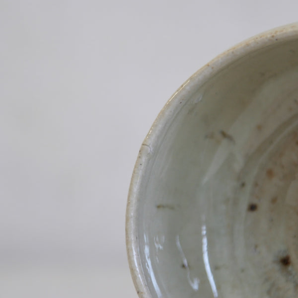 Close-up of a wheel-thrown chawan by Phil Rogers with traditional East Asian influence.