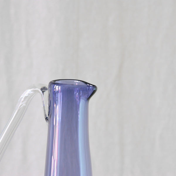 Detail of lip on Tamara Aladin model 1749 carafe for Riihimäki Finland, an early 1960 design combining a tall conical neck with a spherical body.