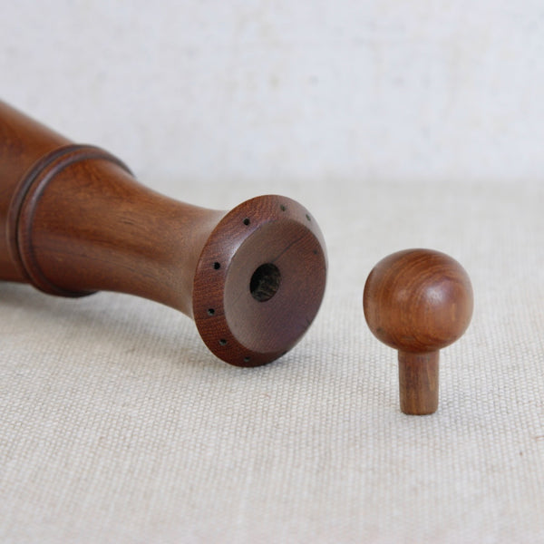 Wooden pepper grinder with stopper removed.  Mid-century modernist Dansk Designs pepper mill 879 by Jens Quistgaard Nordic design classic.