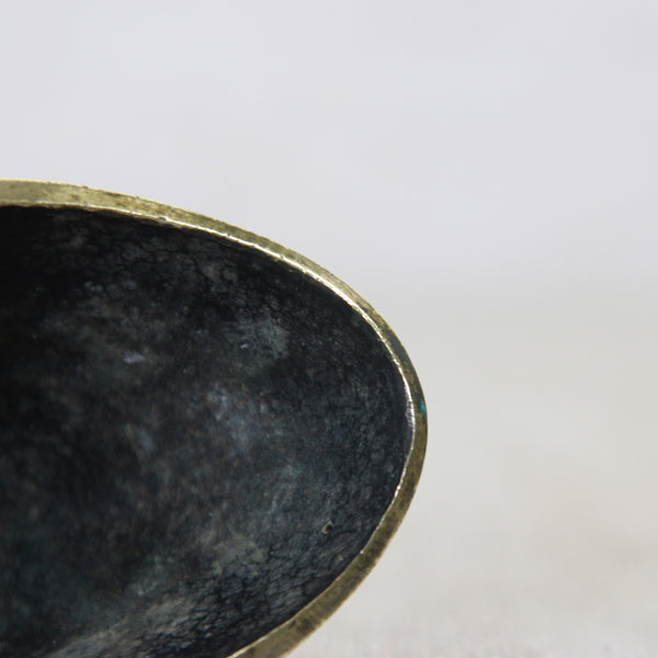 Walter Bosse biomorphic brass bowl made by Herta Baller, reflecting the softened geometry of post-war Austrian design.