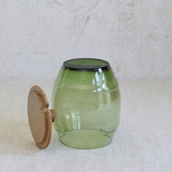 Top down view of a Erik Höglund designed glass and pine jar for Boda, Sweden, circa 1960, showcasing the fusion of traditional woodworking and expressive Swedish glass.