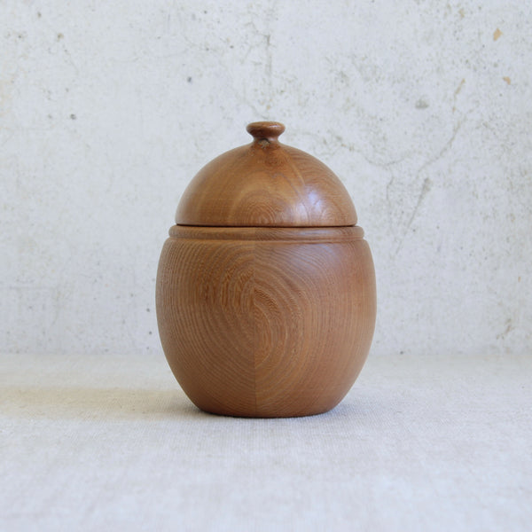 Erik Höglund acorn-form storage box for Boda, a tactile mid-century Swedish design carved from solid staved pine.
