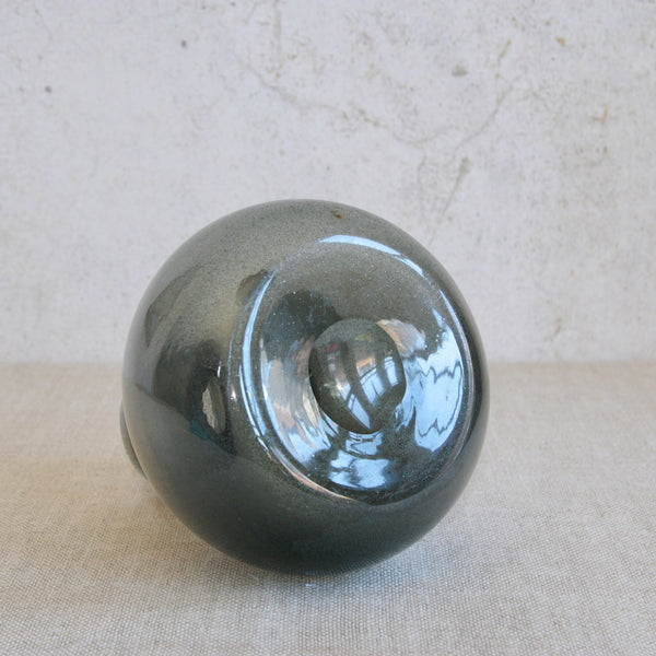 Ground pontil mark on underside / base of an Erik Höglund Boda glass vase, early Swedish modernist design valued by collectors in Japan, the US, and Europe. 