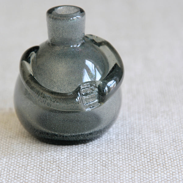 Detail of clutching hands on a Museum-quality Erik Höglund figure bottle in Carborundum glass, Sweden, early 1950s, prized by international collectors of Nordic studio glass.