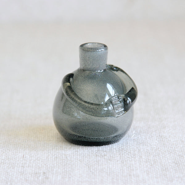 Swedish Modernist figurative bottle by Erik Höglund, handmade at Boda and distinguished by its iridescent, textured Carborundum surface.