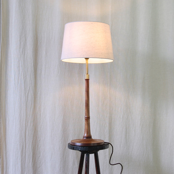 Esben Klint 301/27 in dark ash wood, a flowing example of Danish Modern lighting combining natural timber with warm brass details.