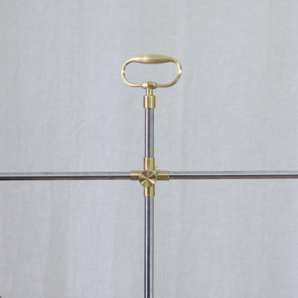 Detail of the stainless-steel and brass construction of Esben Klint's Model 319 adjustable Danish table lamp.
