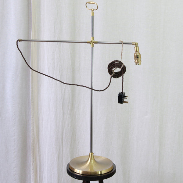 Mid-century Danish task lamp by Esben Klint for Le Klint, with an adjustable articulated arm and directional light source.