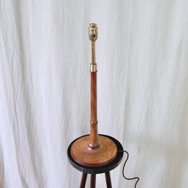 A vintage Esben Klint ash and brass table lamp, a warm and architectural example of post-war Danish Modern design. For sale in the UK from Art & Utility.