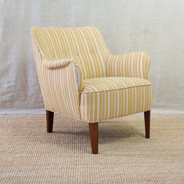 Elegance redefined - the Model 1748 lounge chair by Fritz Hansen upholstered in Fermoie’s York Stripe fabric. Midcentury modern chair design by Peter Hvidt & Orla Mølgaard-Nielsen.
