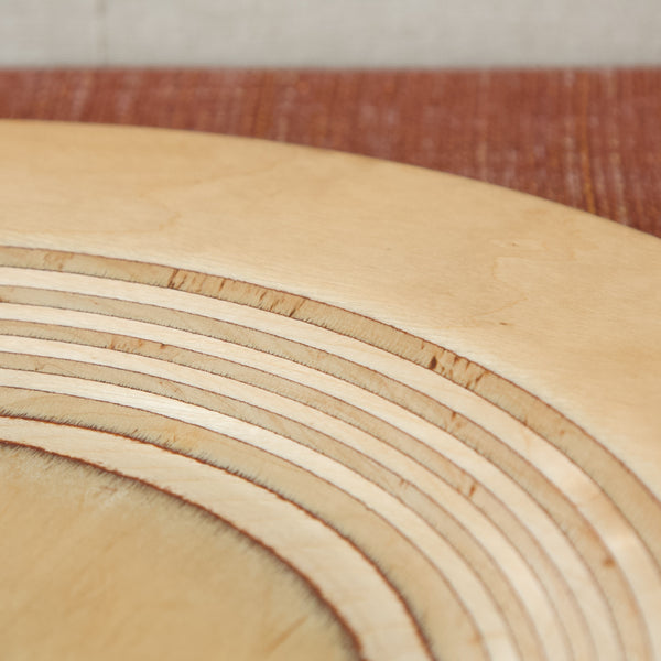 A MidCentury modern Scandinavian serving platter, a signature creation by Eero Saarinen and Keuruu. Buy online from Art & Utility, a London based design gallery who’s collection is a fusion of artistry and functionality.