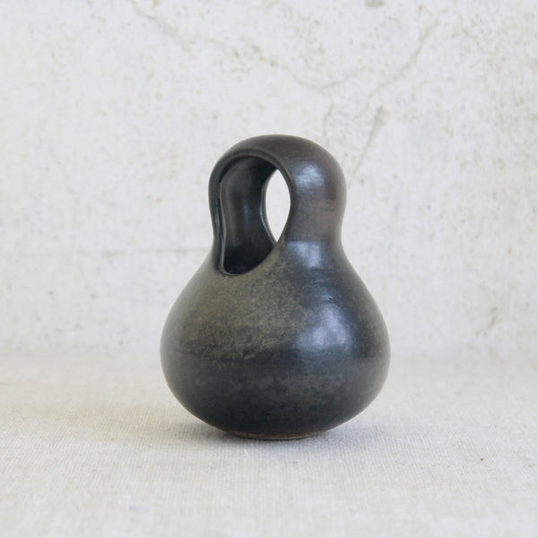 Hooded ceramic vessel designed by Francesca Mascitti Lindh for Arabia, reflecting mid-century Finnish Modernism and organic design.