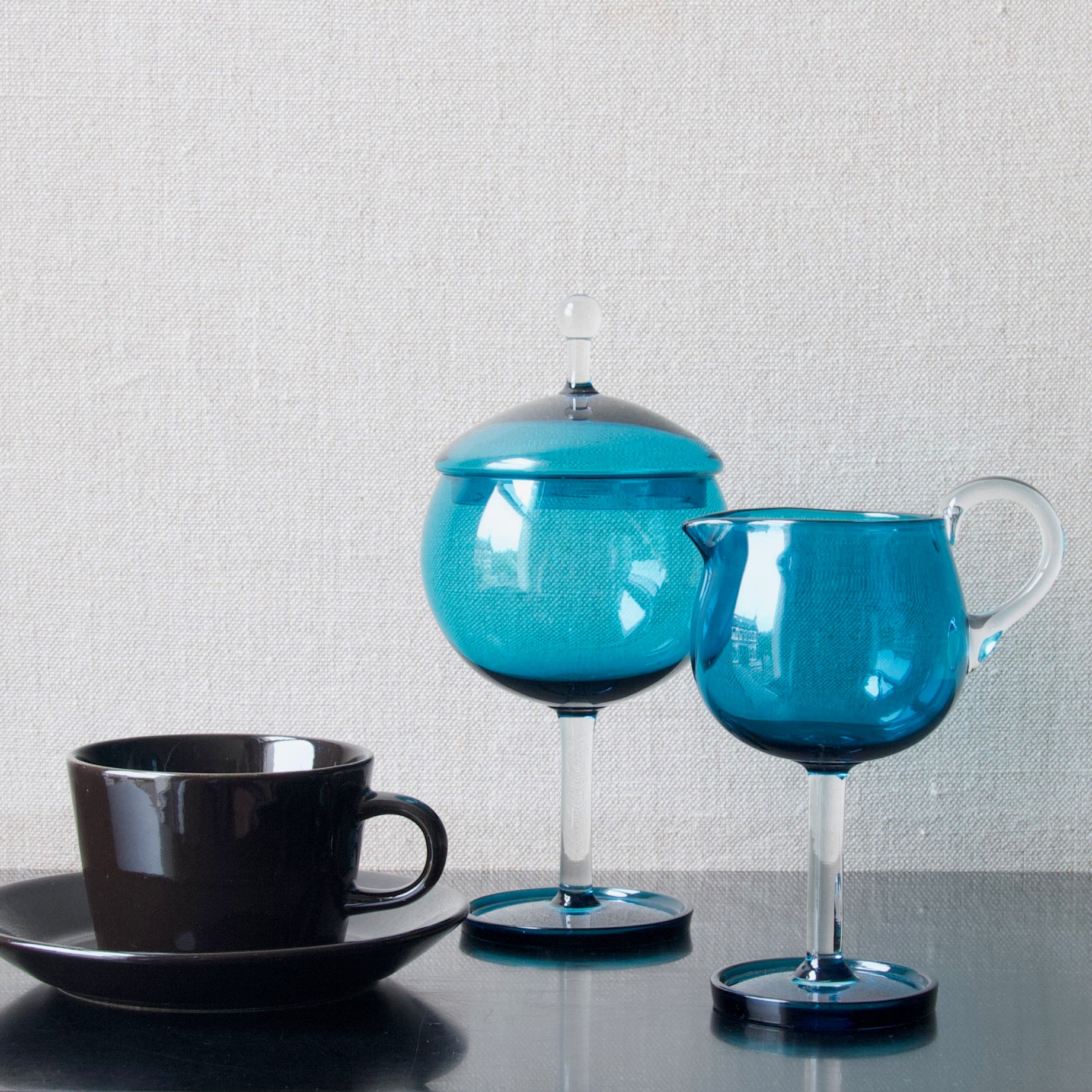 Finnish Modernist design from the 1950's including Kaj Franck Kilta, Arabia Finland, and Nanny Still Harlekiini, Riihimaki 