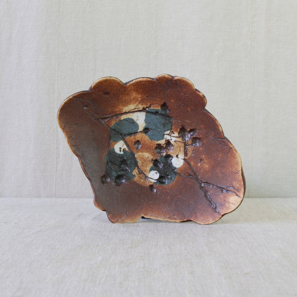 Francesca Mascitti-Lindh ceramic from the Arabia Art Department, combining contrasting coloured clays with incised botanical decoration.
