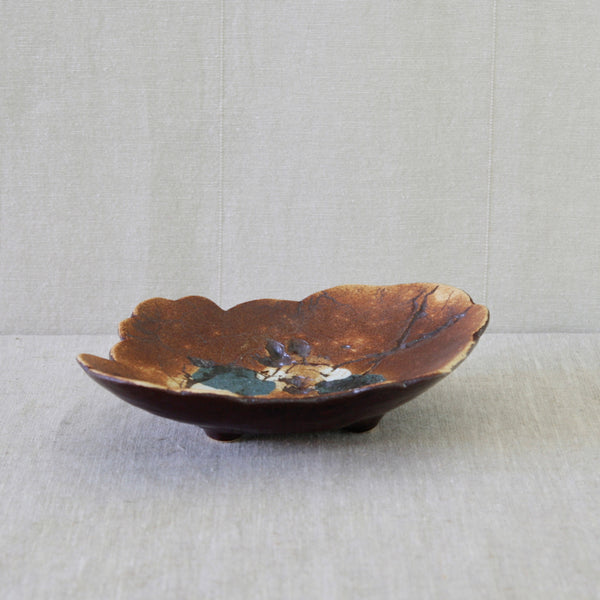 Francesca Mascitti-Lindh botanical stoneware dish, decorated with an abstract composition of incised branches and berry-like forms.
