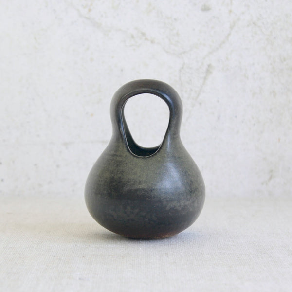 Straight on shot of a sculptural ceramic vessel by Francesca Mascitti Lindh, whose work established her as a leading figure in mid-20th century Finnish studio ceramics. For sale in the UK from Nordic design gallery Art & Utility.