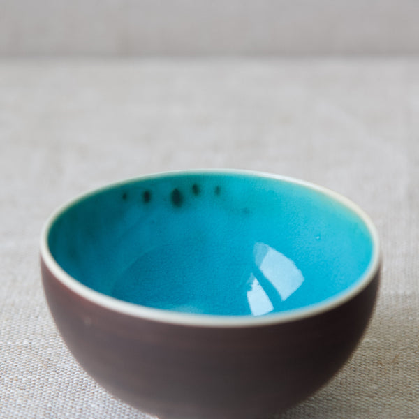 Aqua blue glaze inside a porcelain Modernist tea bowl by Friedl Holzer-Kjellberg, Arabia, Finland, 1950's