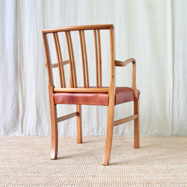 Architectural Model 1675 armchair by Ole Wanscher, with individual beech elements forming a clear and lightweight wooden structure.
